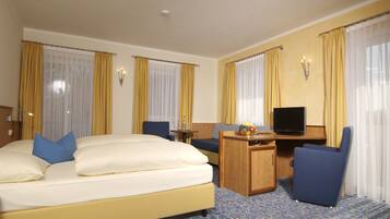 Hypo-allergenic bedding, down duvets, minibar, in-room safe