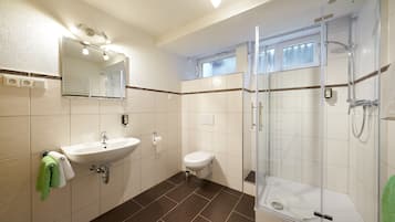 Apartment, 1 Bedroom | Bathroom | Shower, free toiletries, hair dryer, towels