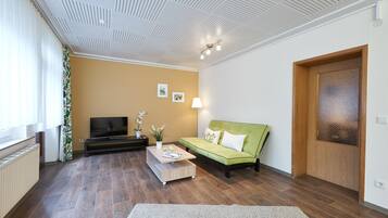 Apartemen, 1 kamar tidur | Area keluarga | TV layar datar