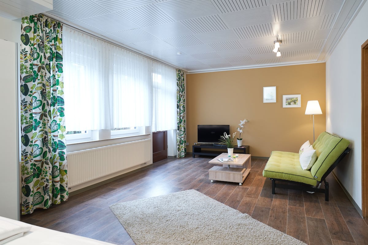 Appartement, 1 slaapkamer | Luxe beddengoed, een kluis op de kamer, verduisterende gordijnen