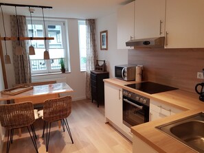 Apartament Comfort | Sala d'estar | Televisor de pantalla plana 