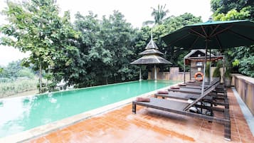 Outdoor pool, pool umbrellas, pool loungers