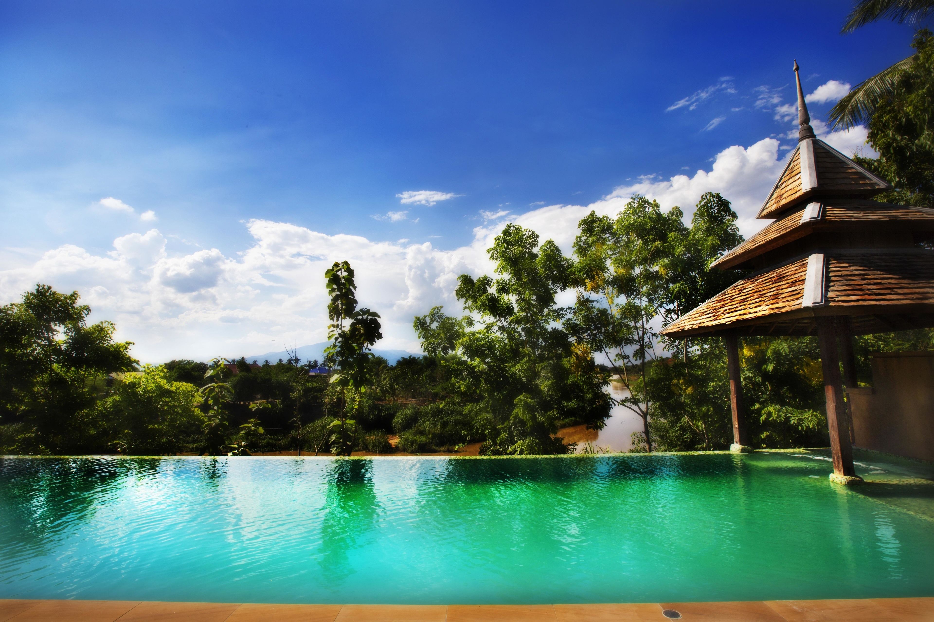 Outdoor pool, pool umbrellas, sun loungers