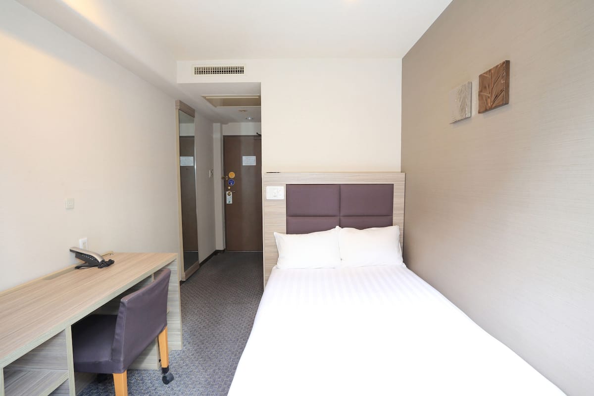 Desk, blackout curtains, free WiFi, bed sheets