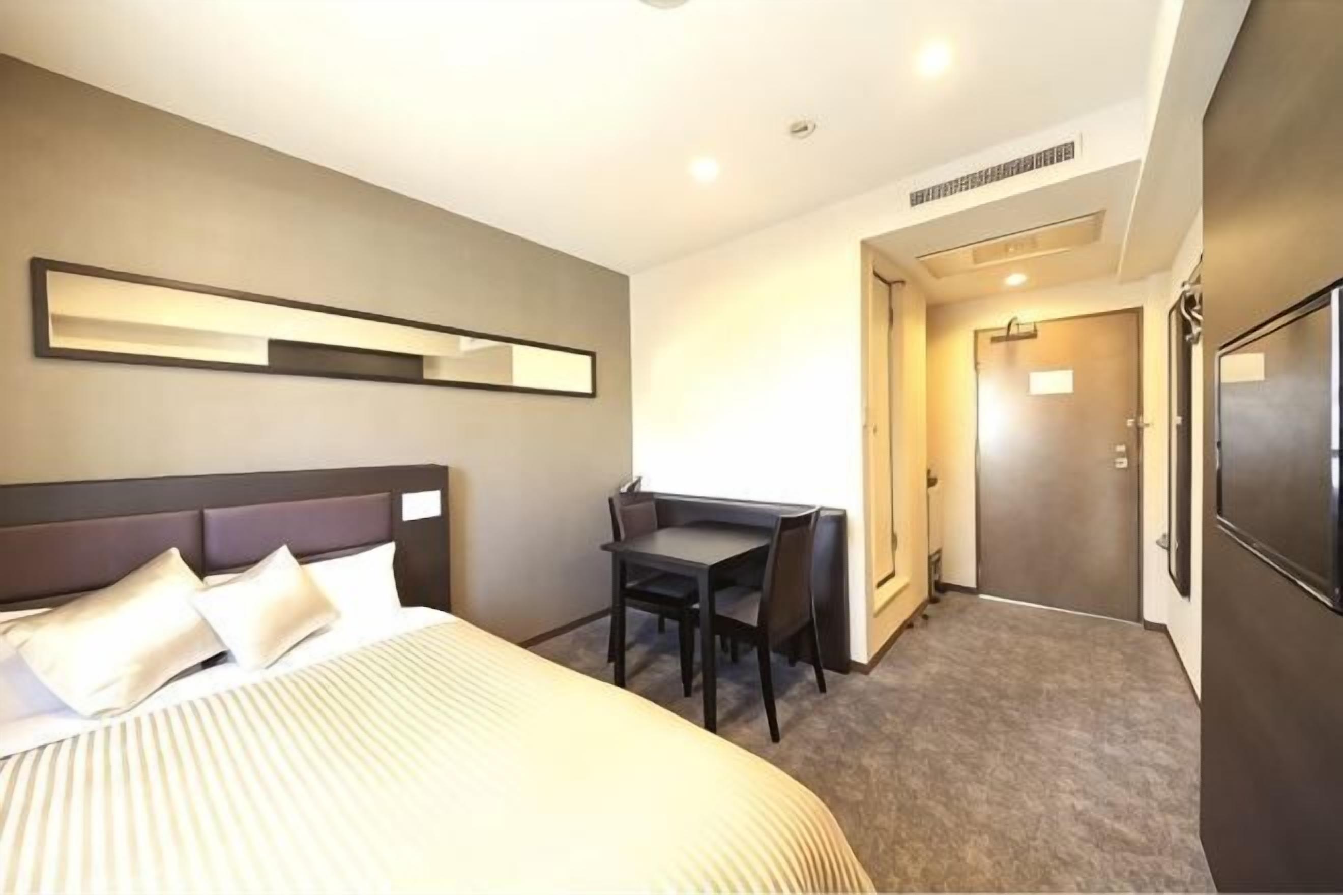 Desk, blackout curtains, free WiFi, bed sheets