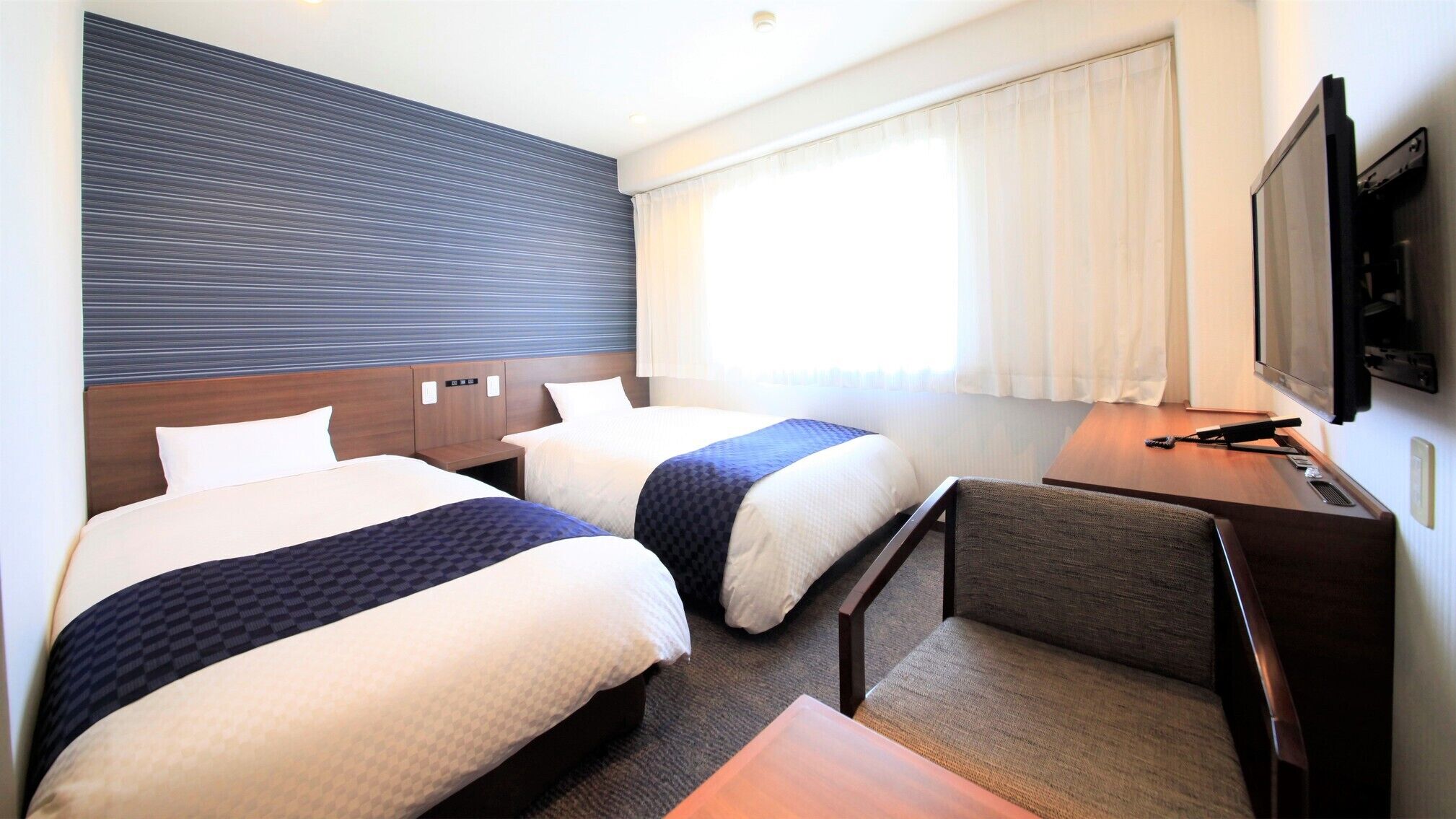 Desk, blackout curtains, free WiFi, bed sheets