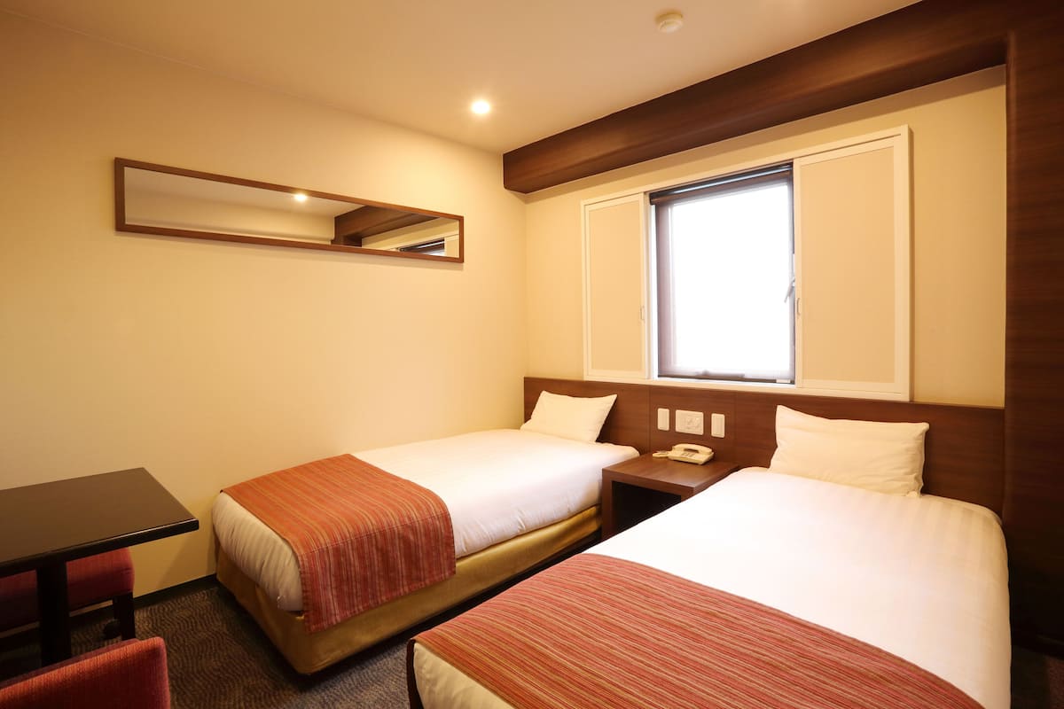 Desk, blackout curtains, free WiFi, bed sheets