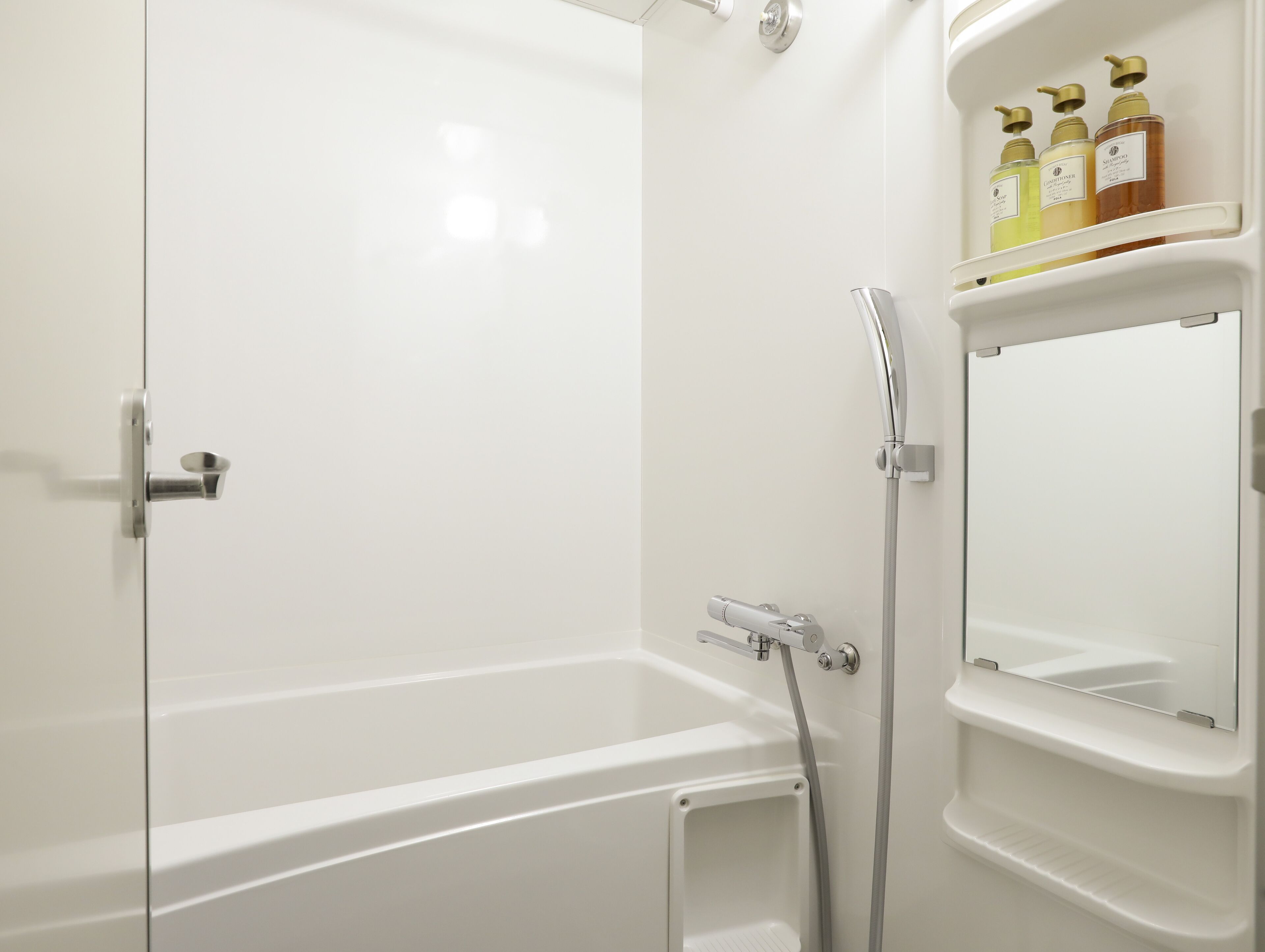 combined shower/bathtub, free toiletries, hair dryer, bathrobes