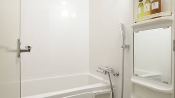 Combined shower/tub, free toiletries, hair dryer, bathrobes