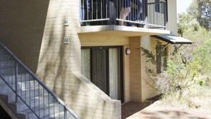 A two-story building with a balcony, a staircase, and a brick facade. - ECU Joondalup Village (Joondalup)