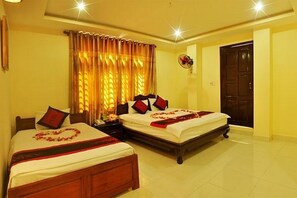 Quarto triplo luxo | Frigobar, quartos à prova de som, Wi-Fi de cortesia, roupa de cama