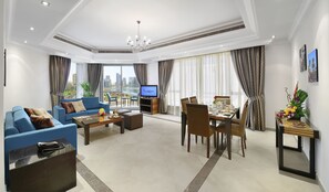 Deluxe Apartment, 2 Bedrooms, Lagoon View | Living area | LCD TV - Al Majaz Premiere Hotel Apartment (Sharjah)