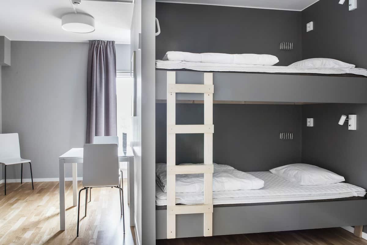 Economy Quadruple Room, Shared Bathroom (optional bed linens/towel) | Blackout drapes, soundproofing, iron/ironing board, cribs/infant beds