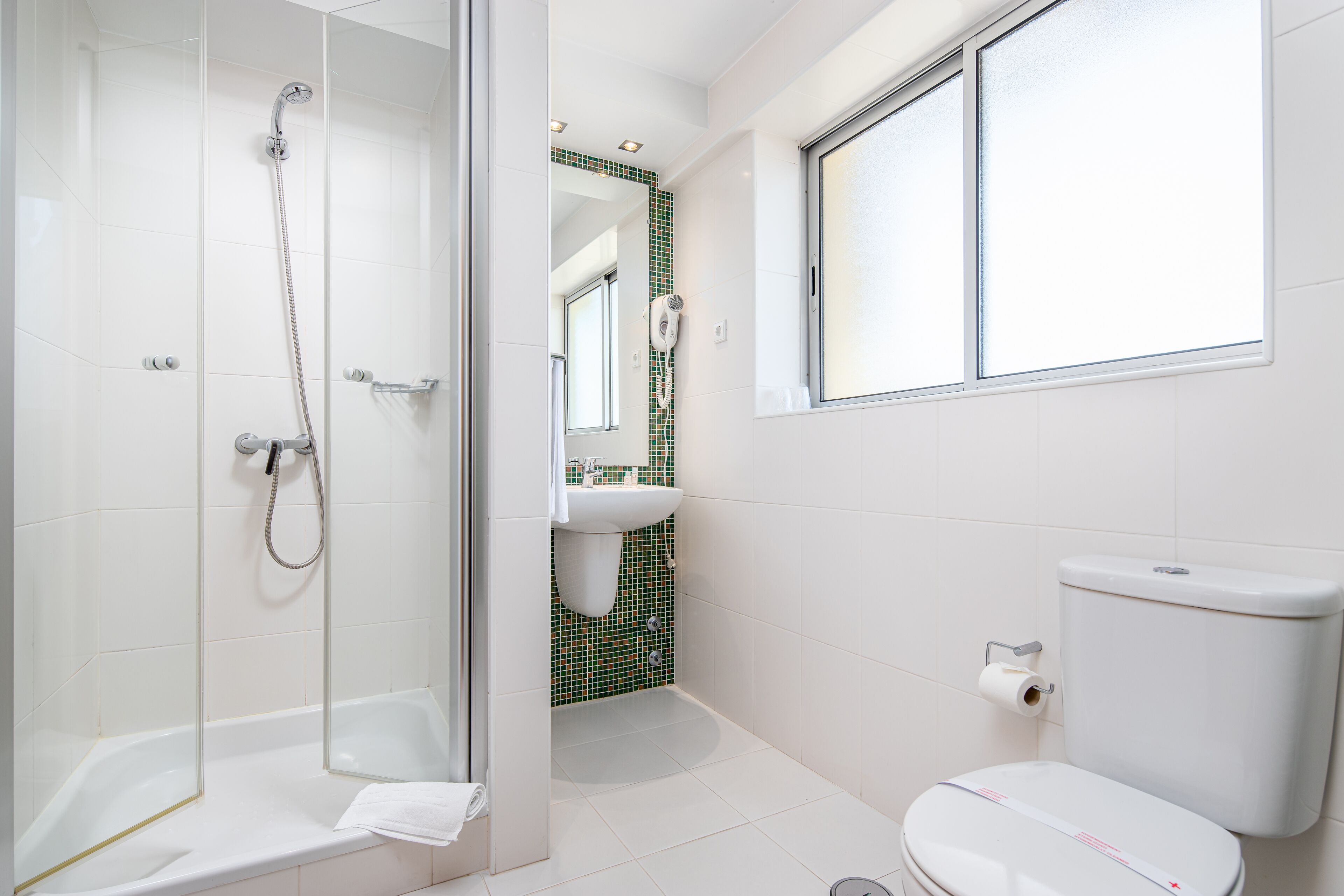 free toiletries, hair dryer, towels, soap