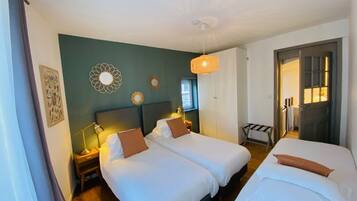 Habitación familiar | Ropa de cama de alta calidad y decoración individual