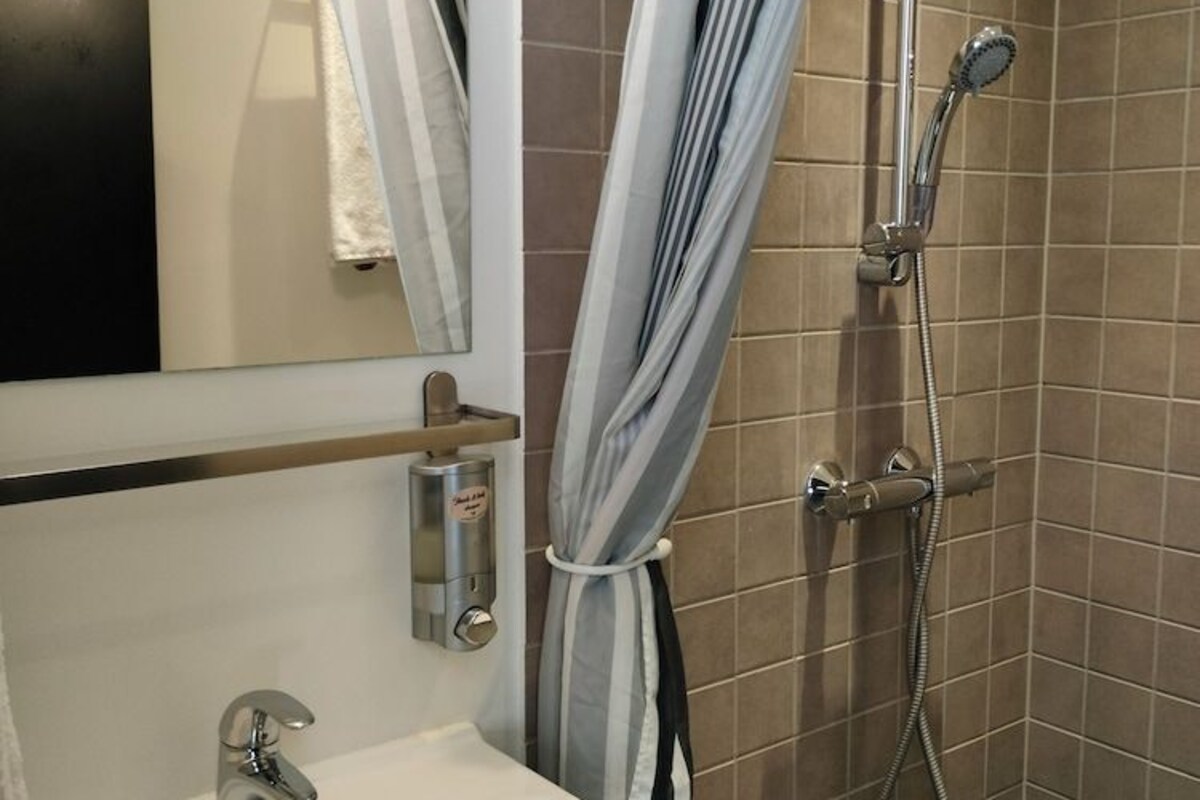 Bathroom | Shower, hair dryer, towels, soap