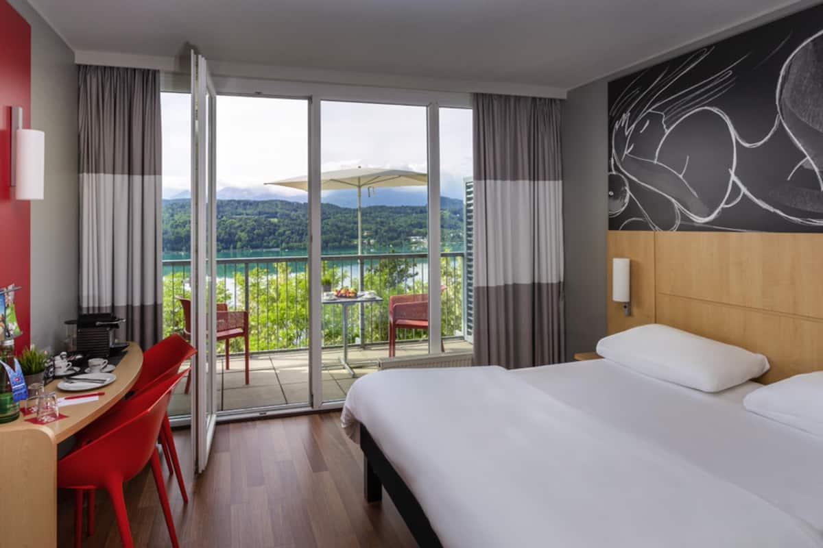 superior room, 1 queen bed, lake view | desk, soundproofing, free cots/infant beds, free wifi