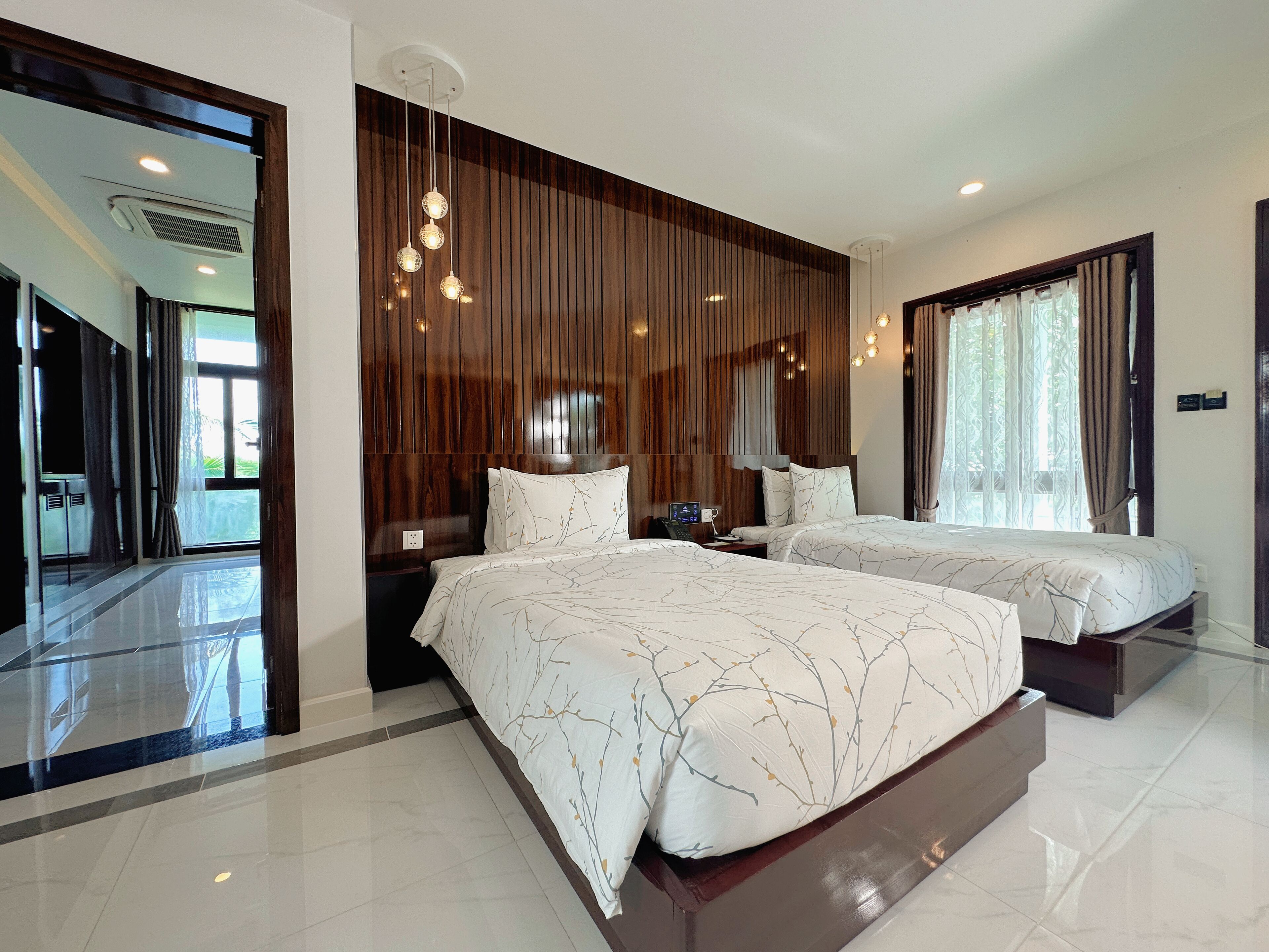 family suite, 2 bedrooms, sea view | in-room safe, individually decorated, individually furnished, desk