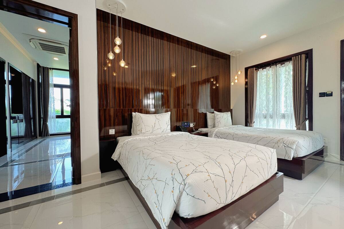 family suite, 2 bedrooms, sea view | in-room safe, individually decorated, individually furnished, desk