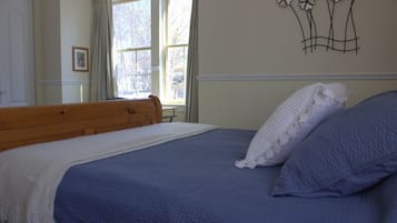 Desk, blackout drapes, iron/ironing board, rollaway beds