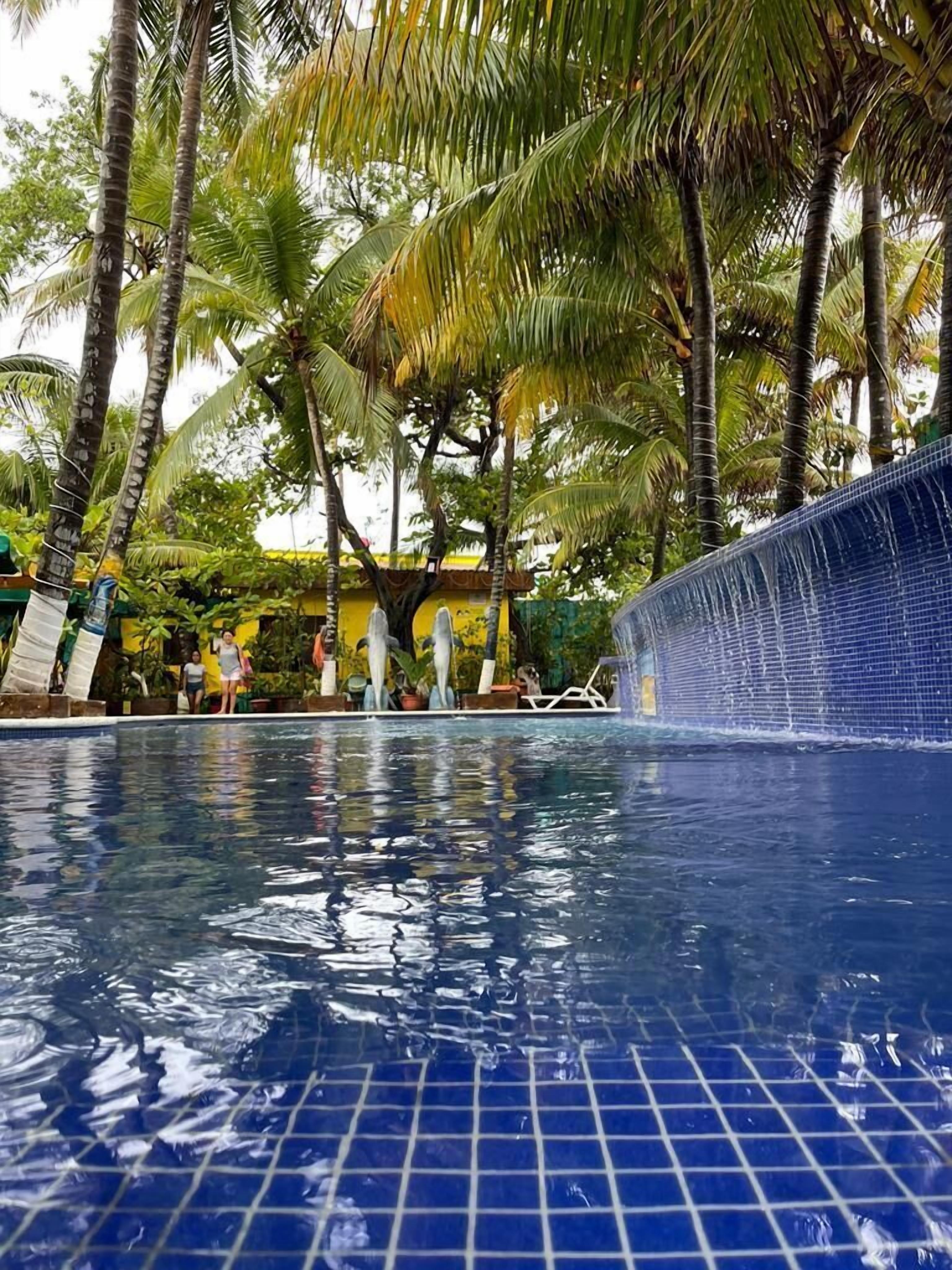 4 outdoor pools, open 8:00 AM to 10:00 PM, pool umbrellas, sun loungers