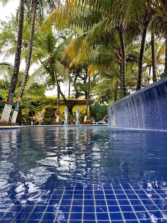 4 outdoor pools, open 8:00 AM to 10:00 PM, pool umbrellas, sun loungers