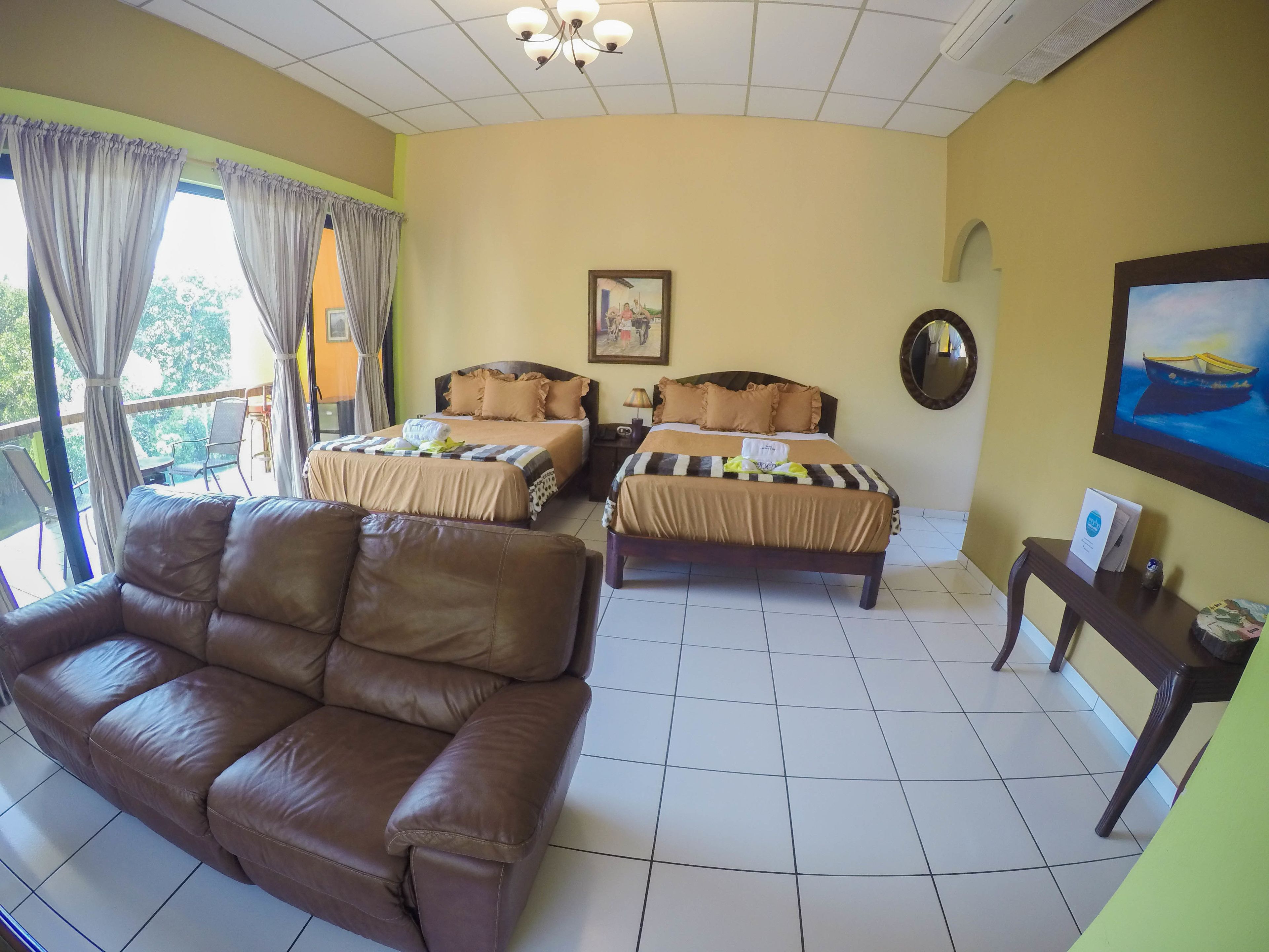 Standard Room, 2 Queen Beds, Resort View | Minibar, in-room safe, soundproofing, bed sheets