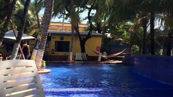 4 outdoor pools, open 8:00 AM to 10:00 PM, pool umbrellas, pool loungers