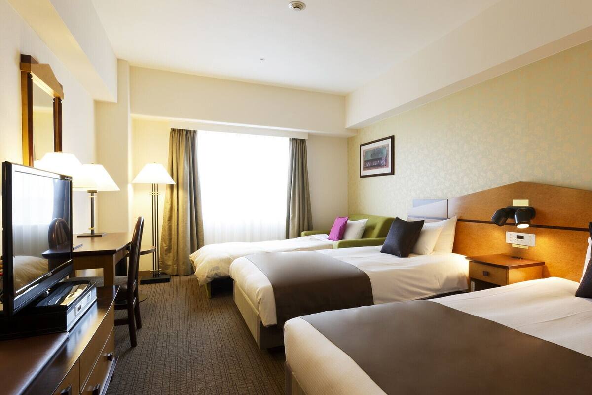 Down comforters, desk, blackout drapes, WiFi (free)