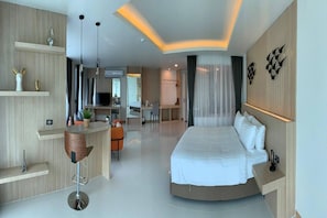 Suite Junior | Coffres-forts dans les chambres, rideaux occultants, Wi-Fi gratuit