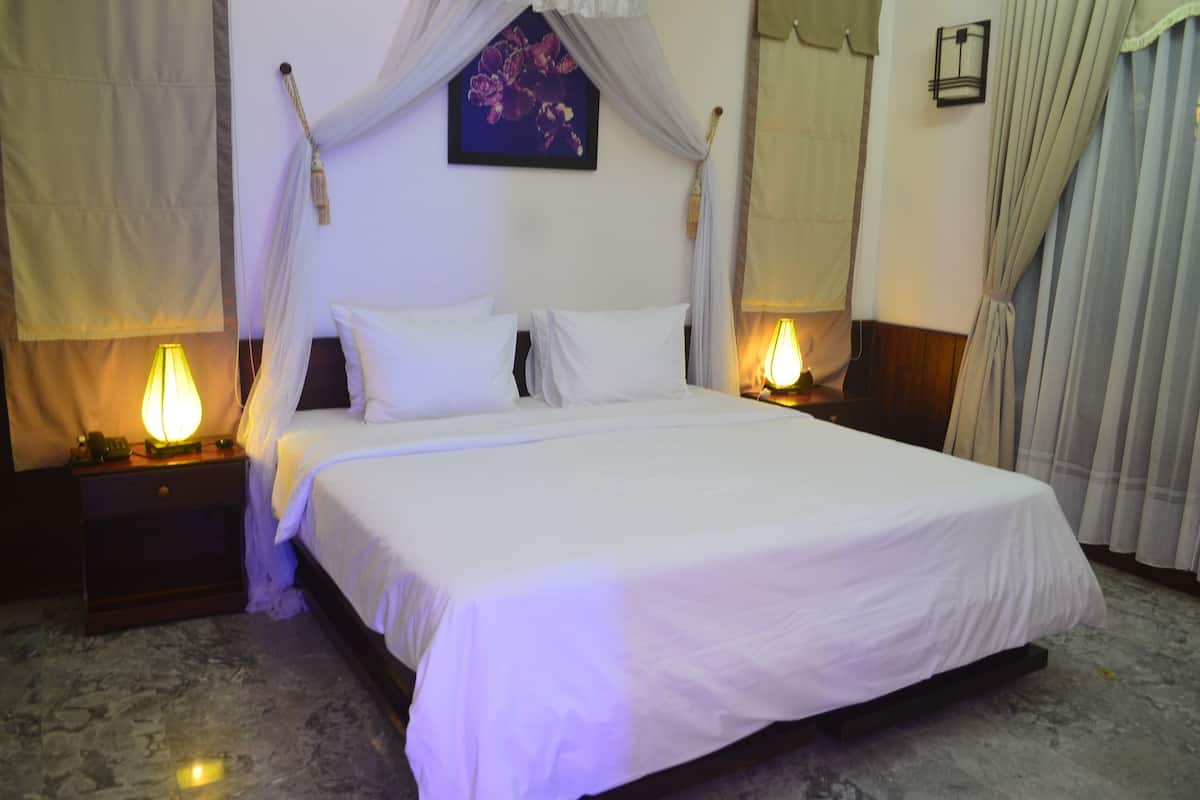 Luxe beddengoed, een minibar met enkele gratis items