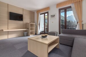 Superior Quadruple Room, 2 Bedrooms | Living area | 37-inch LCD TV with cable channels, TV