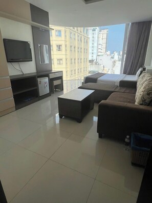 Vip room with sofa bed | Down comforters, minibar, desk, blackout drapes - Princess Hotel (Da Nang)