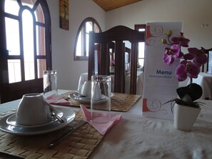 Breakfast, lunch, dinner served; ocean views