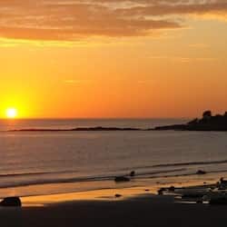 On the beach, black sand, fishing
