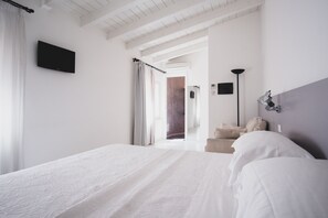 Chambre Standard Double ou avec lits jumeaux | Literie de qualité supérieure, couette en duvet d'oie, minibar, bureau