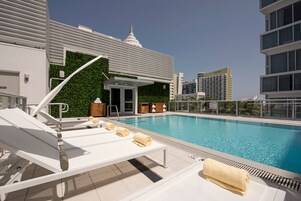 Outdoor pool, pool umbrellas, sun loungers