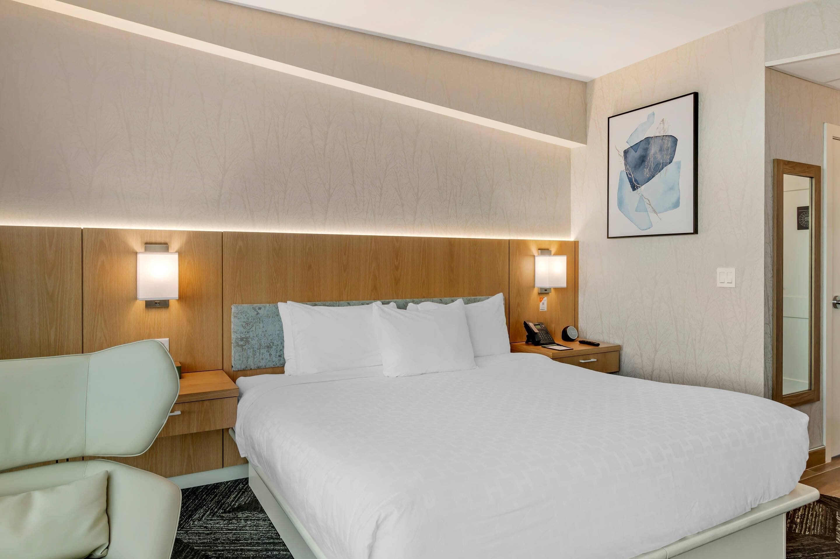 Hypo-allergenic bedding, pillowtop beds, desk, blackout drapes