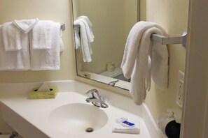 Combined shower/bathtub, hair dryer, towels, soap