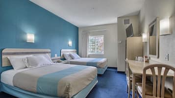 Escriptori, espai de treball apte per a portàtils i roba de llit