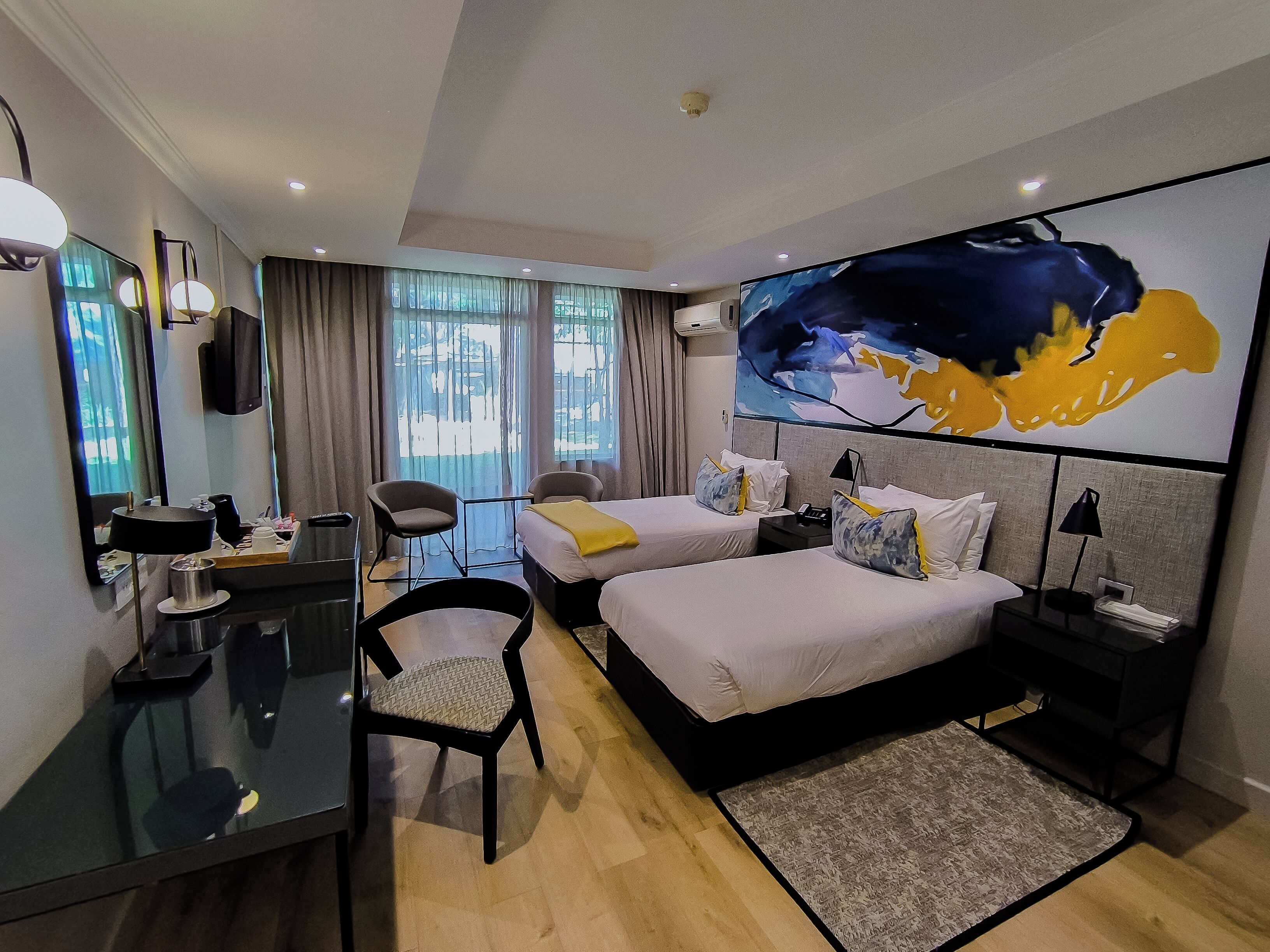 标准房, 2 张单人床, 花园景观 | 客房内保险箱、办公桌、免费 WiFi、床单