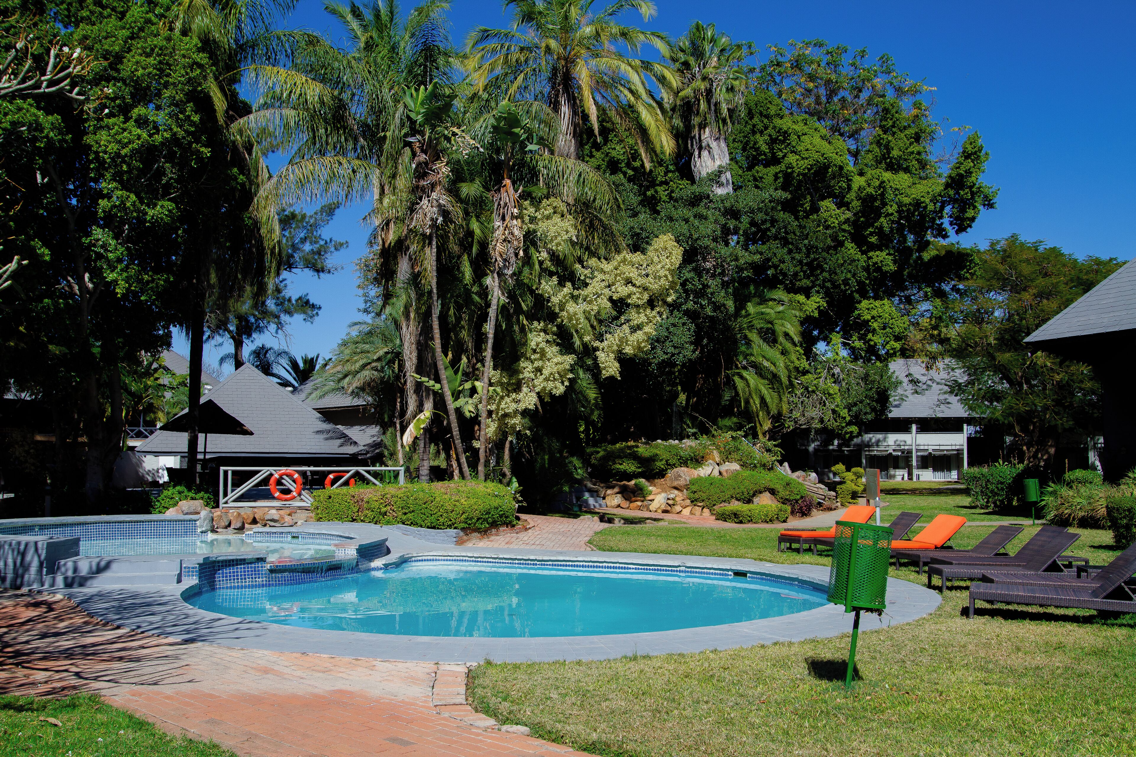 Outdoor pool, open 6:00 AM to 6:00 PM, pool umbrellas, sun loungers