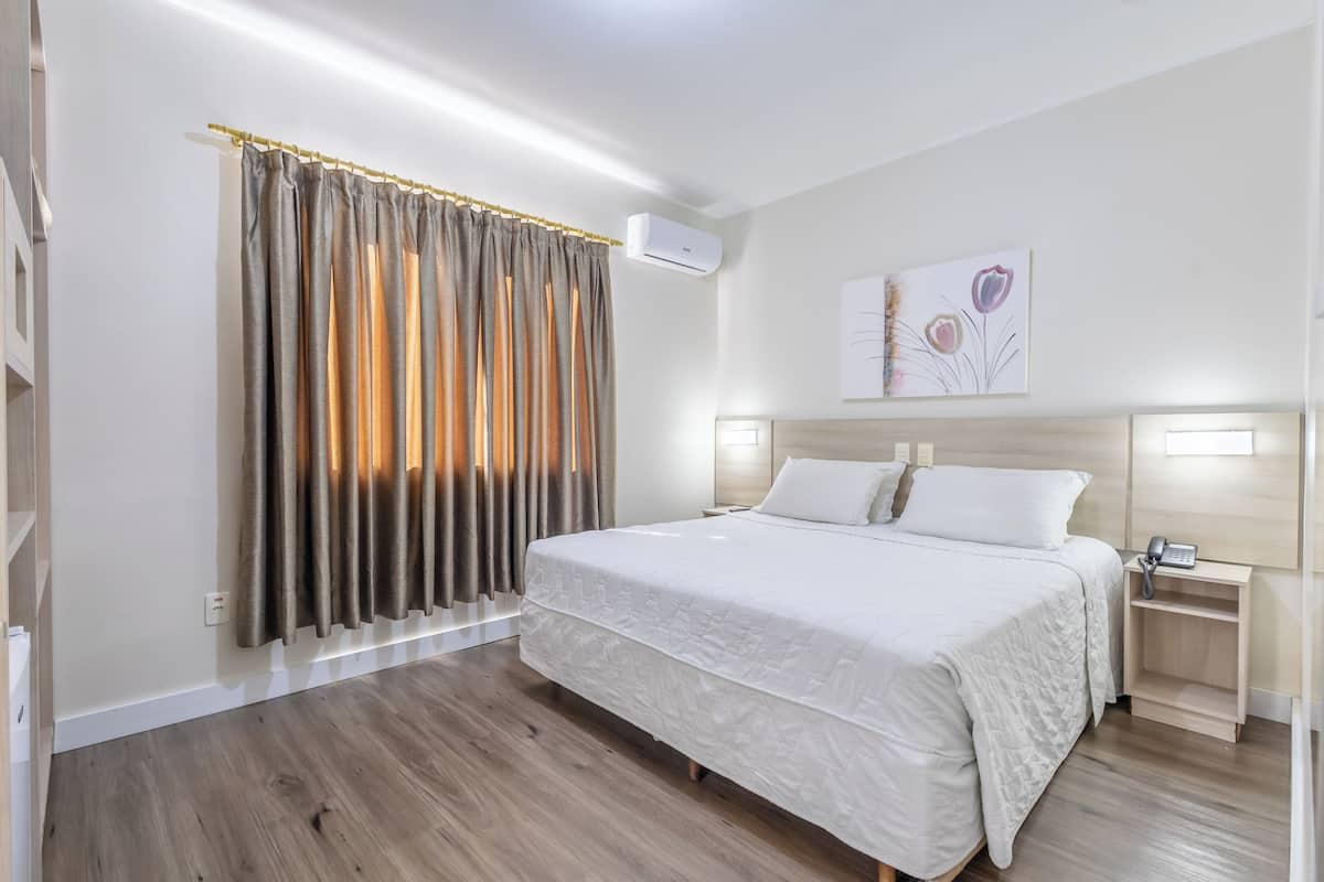Double Room | Minibar, desk, laptop workspace, blackout drapes