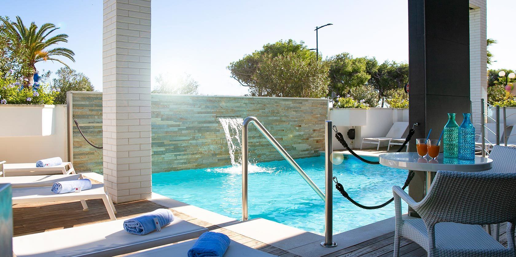Seasonal outdoor pool, pool loungers