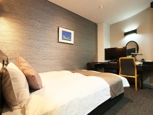 A hotel room with a bed, a desk, a chair, a television, and a wall-mounted artwork. - Hotel AreaOne Chitose (Chitose)