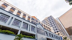 A hotel with a modern facade, multiple balconies, and a sign indicating it is a hotel. - Dolphin Hotel, Chow Kit Kuala Lumpur (Kuala Lumpur)