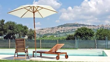 Seasonal outdoor pool, pool umbrellas, sun loungers