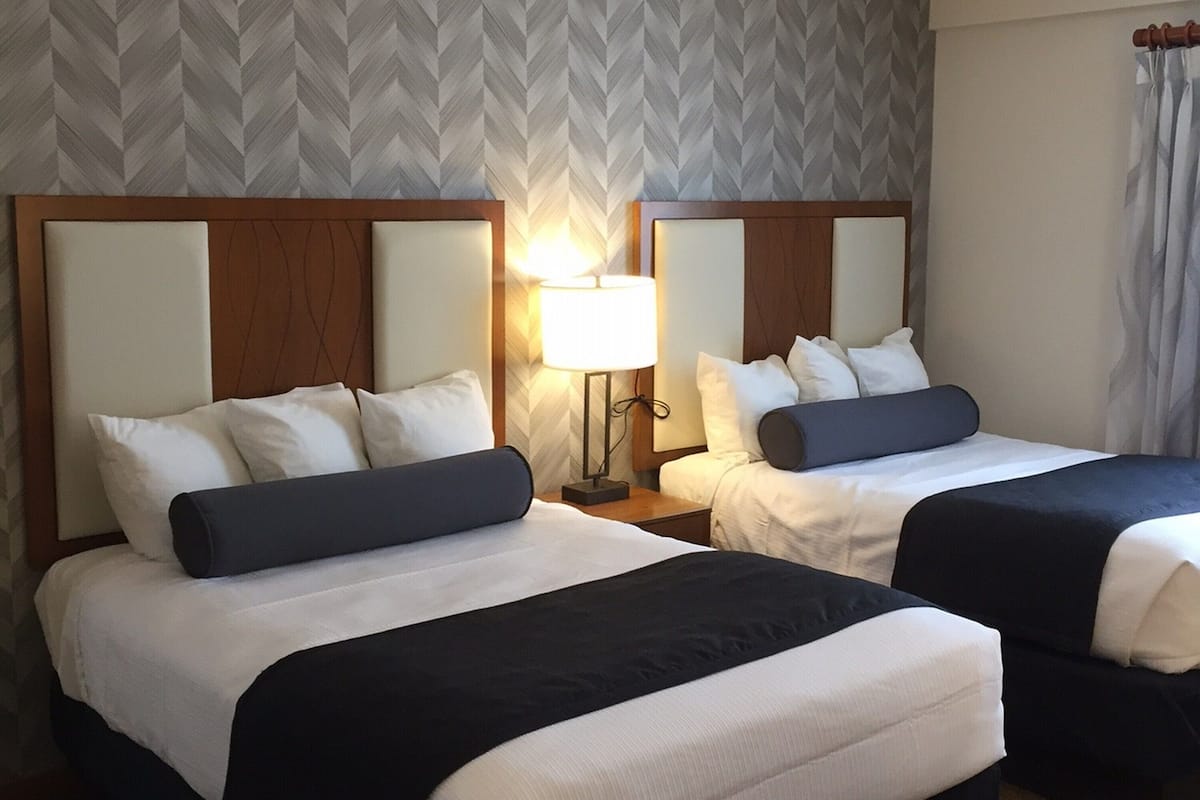 Room, Multiple Beds | Blackout drapes, iron/ironing board, free WiFi, bed sheets