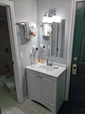 Standard Suite, 1 Bedroom | Bathroom | Combined shower/tub, deep soaking tub, free toiletries, hair dryer