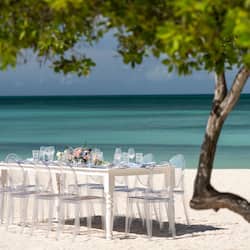 Enjoy a romantic beachside meal with a beautiful ocean view.